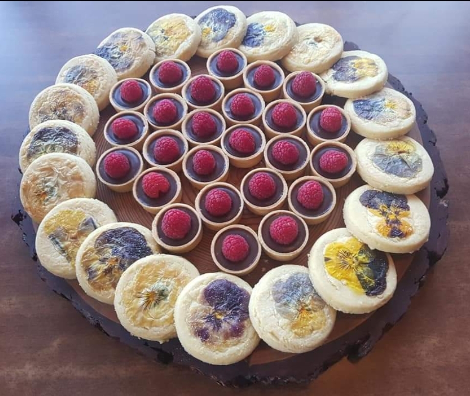 Pressed-flower shortbread and raspberry tarts