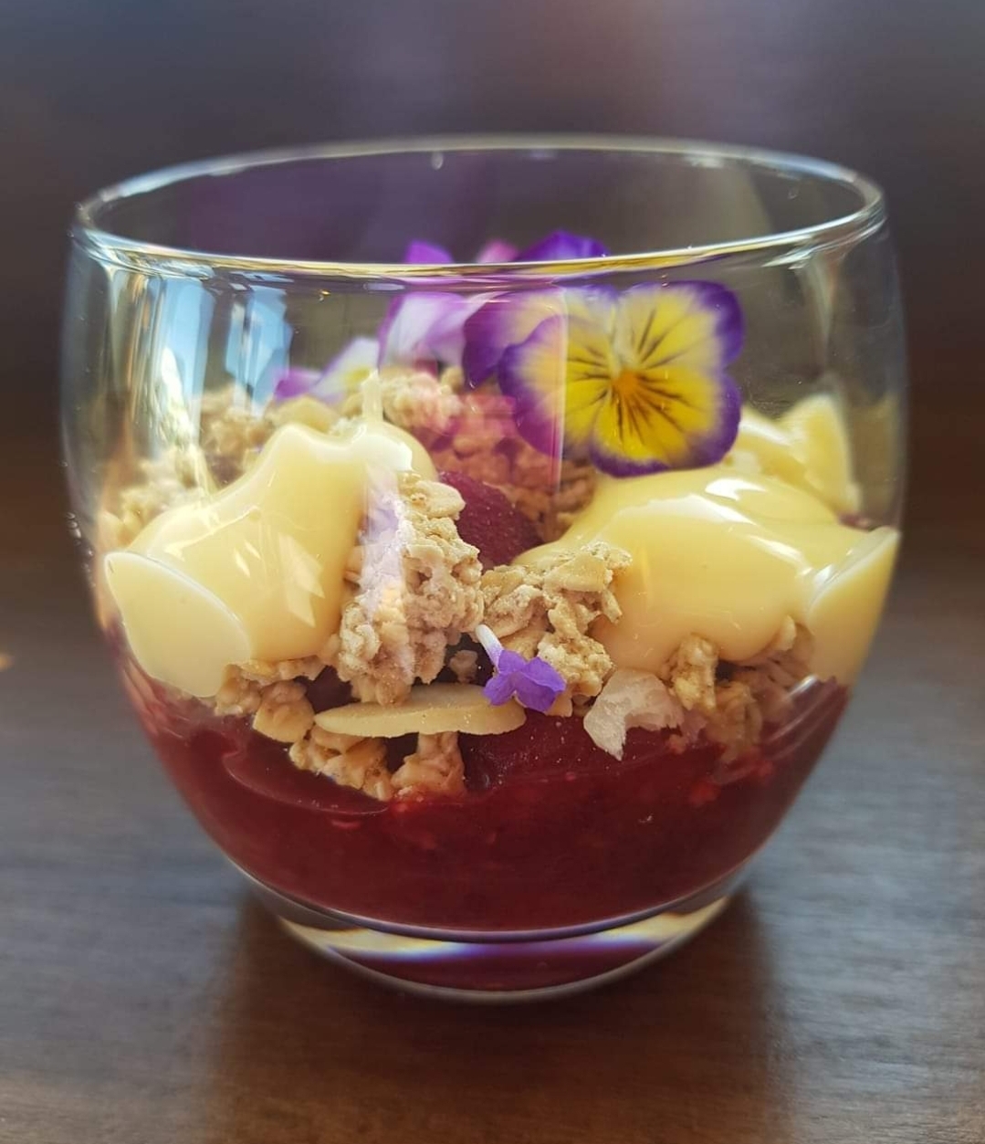 Berry, granola and custard parfait